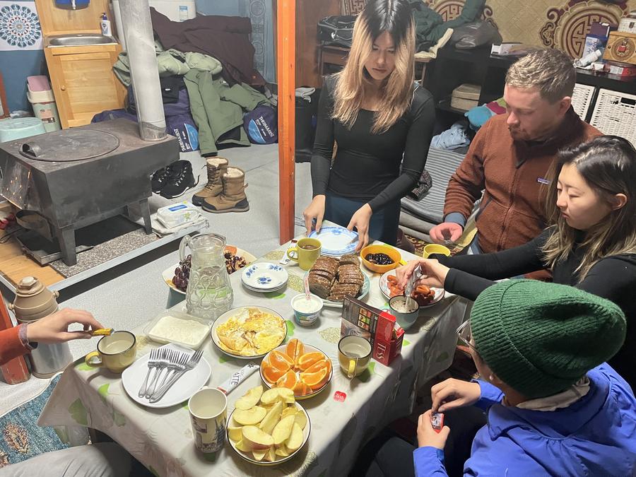 Warming up with tea and treats after a cold night spent in Gatchuurt, at the eastern edge of Ulaanbaatar.